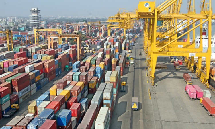 Unloading closed, pile of containers at Chittagong port